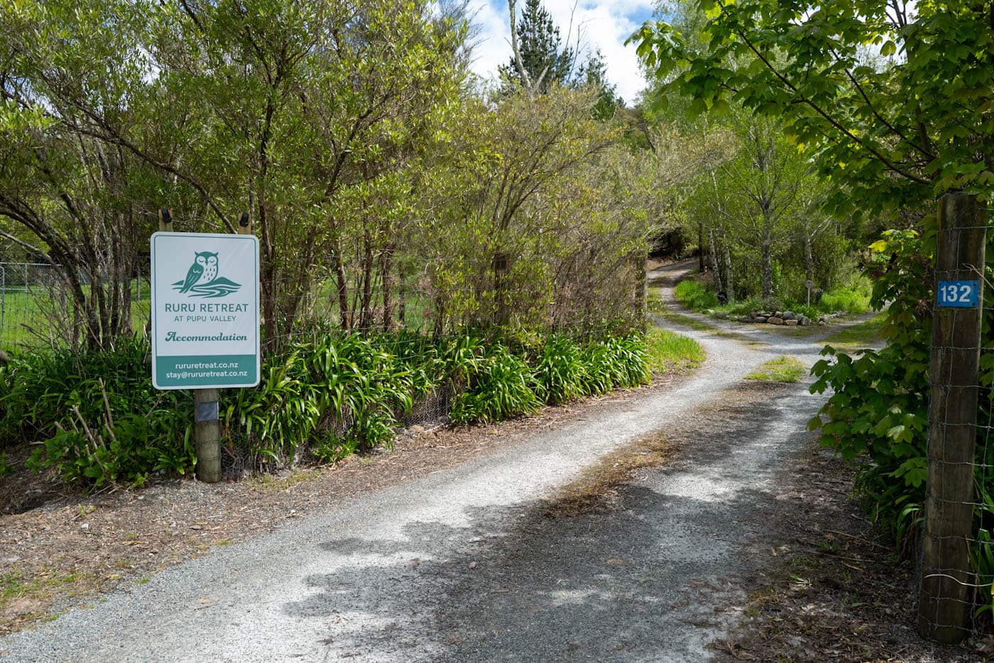 Driveway entrance to Ruru Retreat surrounded by native bush